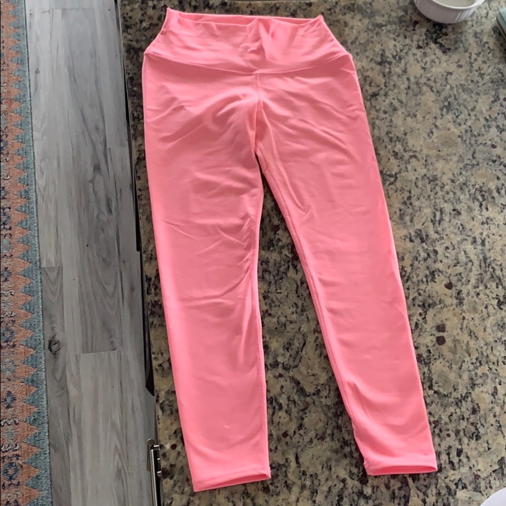 bright pink ALO yoga leggings